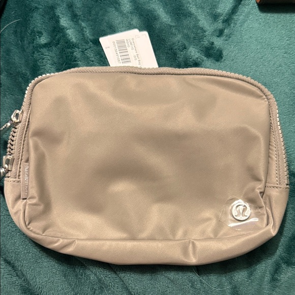 lululemon athletica Handbags - Lululemon Athletica Beige Cosmetic Bag